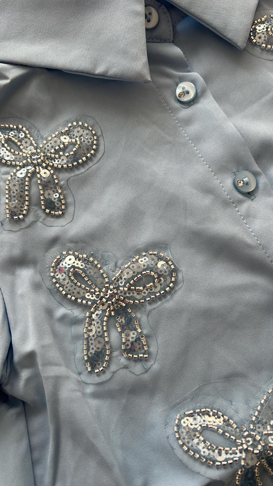 Blouse met strikjes